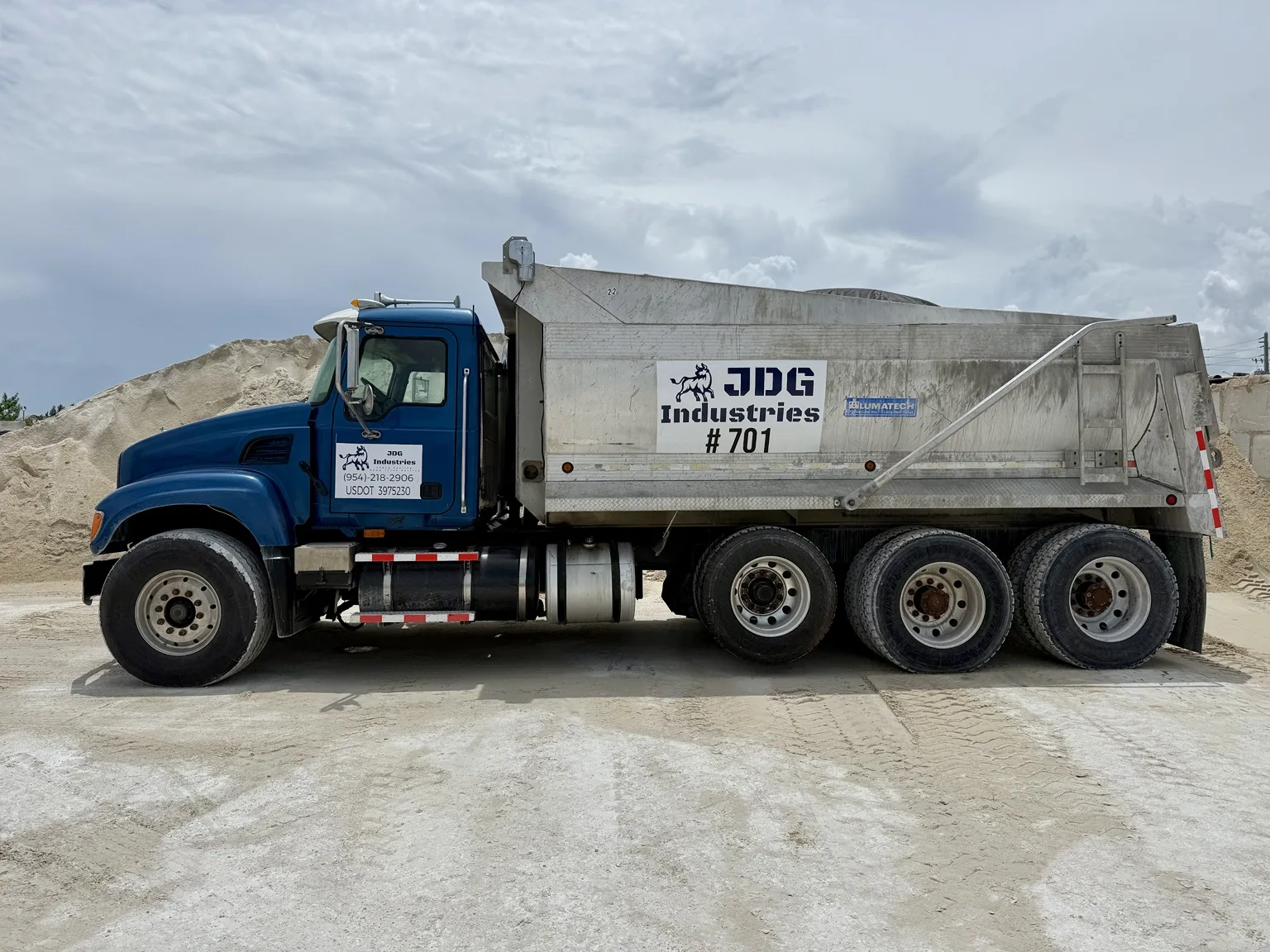 JDG blue dump truck 701 at an aggregate quarry